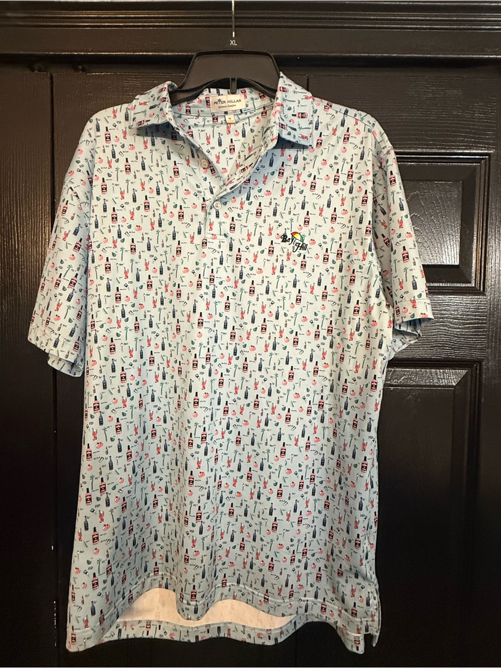 Peter Millar Light Blue Short-Sleeve Polo with Red & Navy Print. Bay Hill